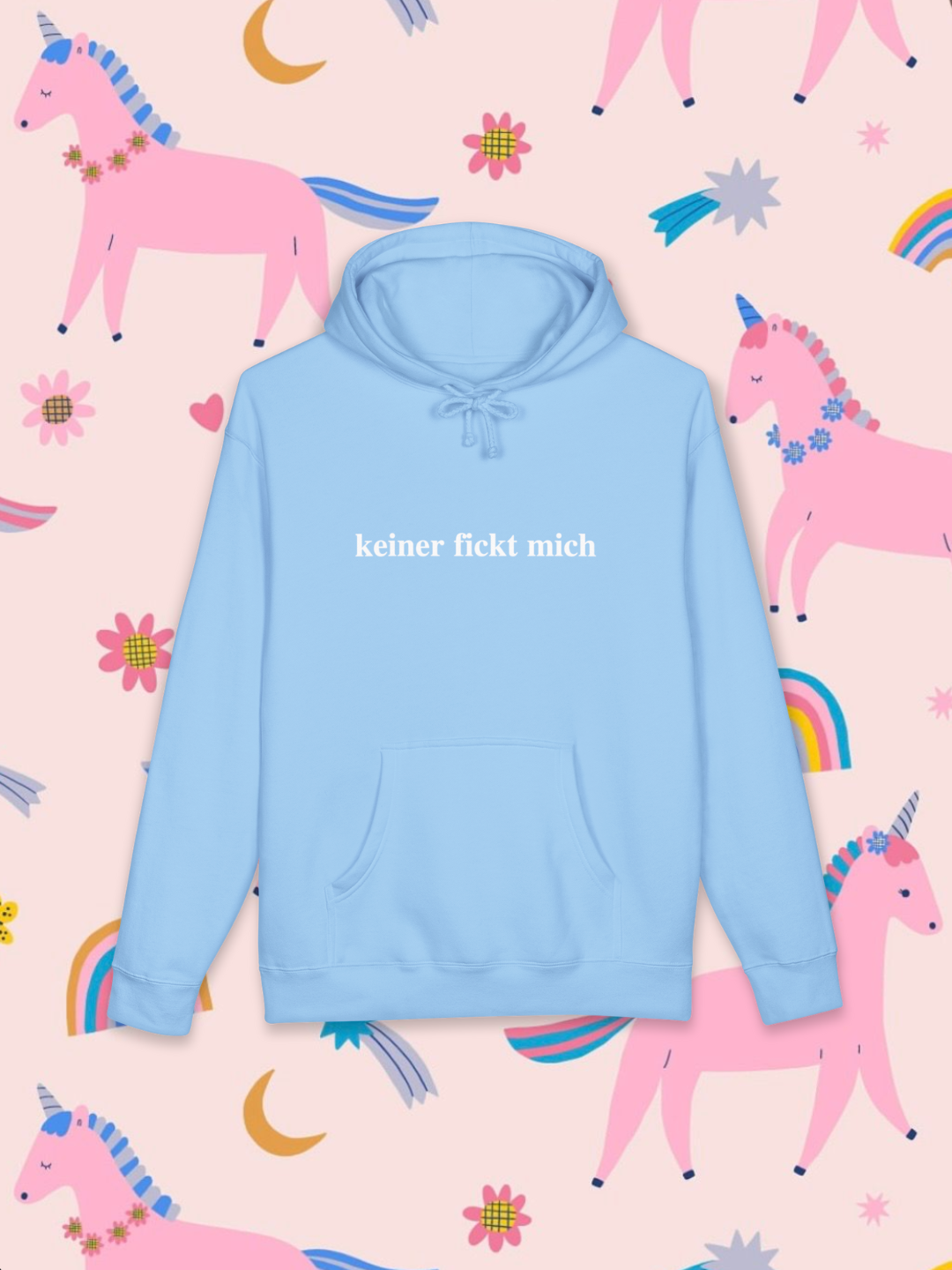 Light blue hoodie with 'keiner flicht mich' text on a pink background with cartoon unicorns and flowers.