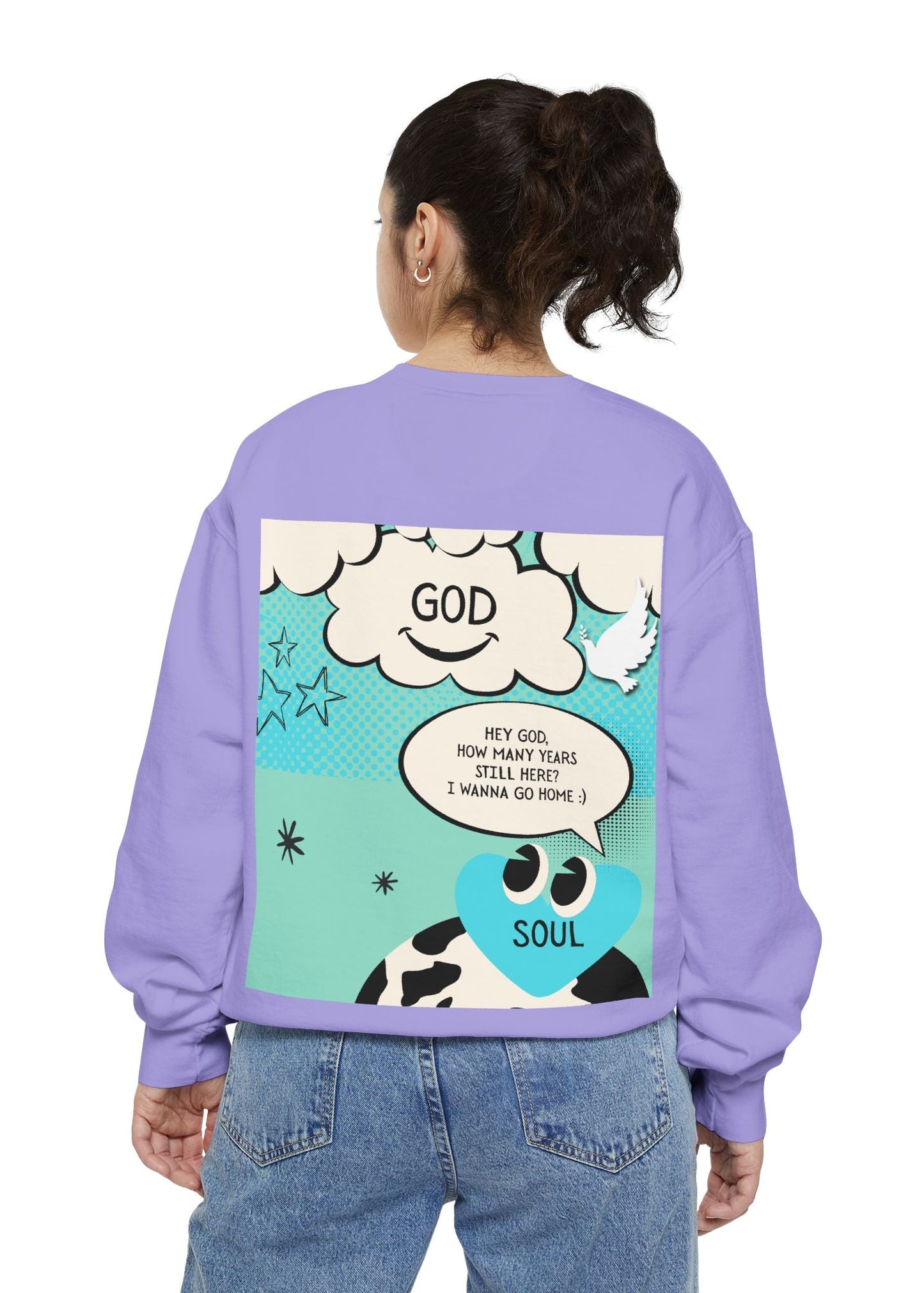 Person wearing a purple sweatshirt with a graphic design on the back, featuring text and a cow illustration.