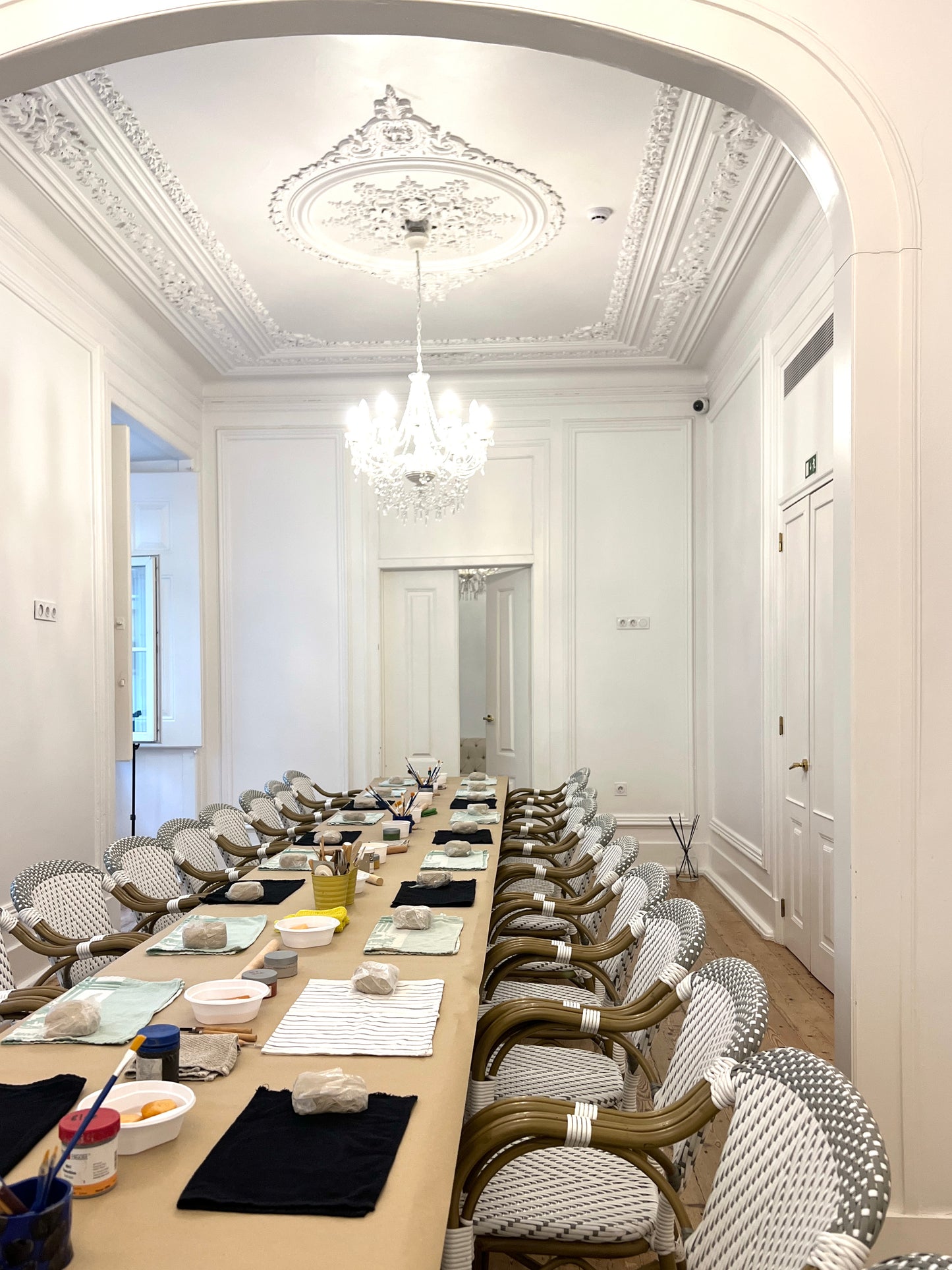 Elegant dining room with long table and ornate ceiling