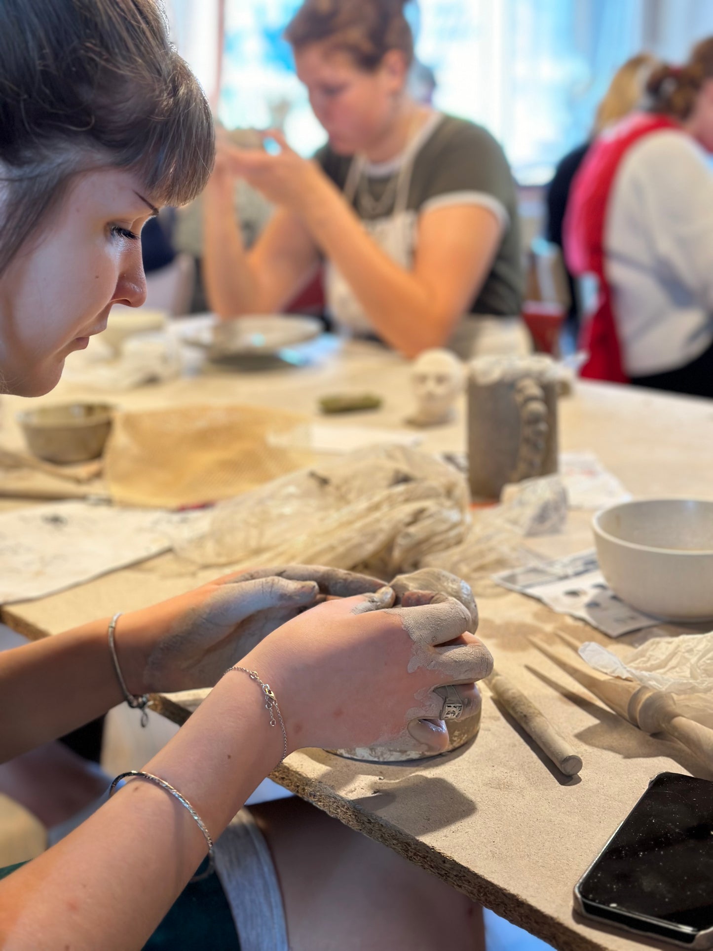 Ceramic Handbuilding Workshop with Marika and Ivika in Noarootsi Peninsula, Estonia, lady creating, by subcultours