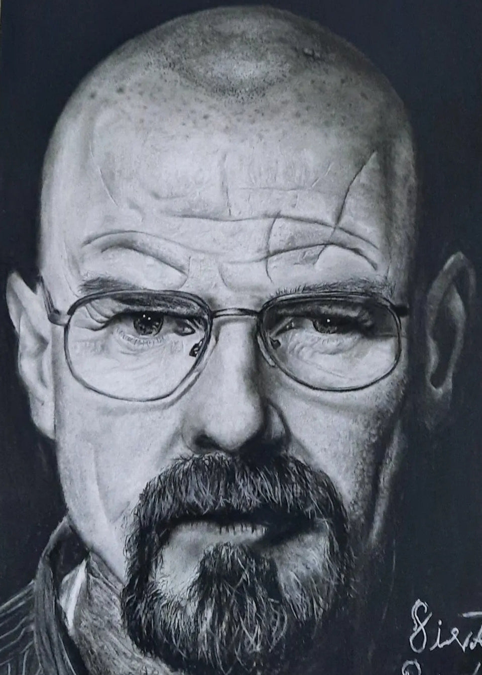 A black and white pencil portrait drawing of a bald man with glasses and a beard, shown close up on a dark background with a wood surface edge visible at the left.