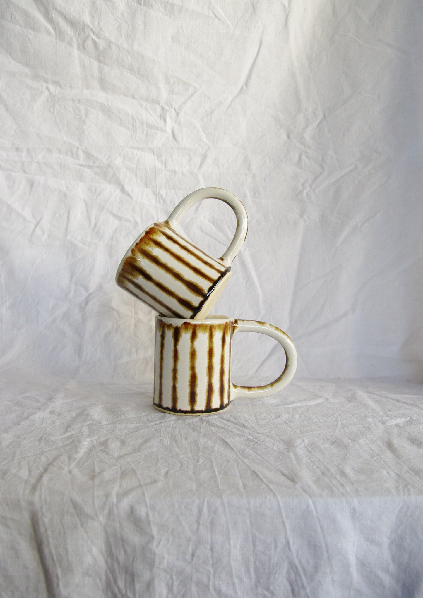 "Striped Mug" Artwork by Daisy Eltenton