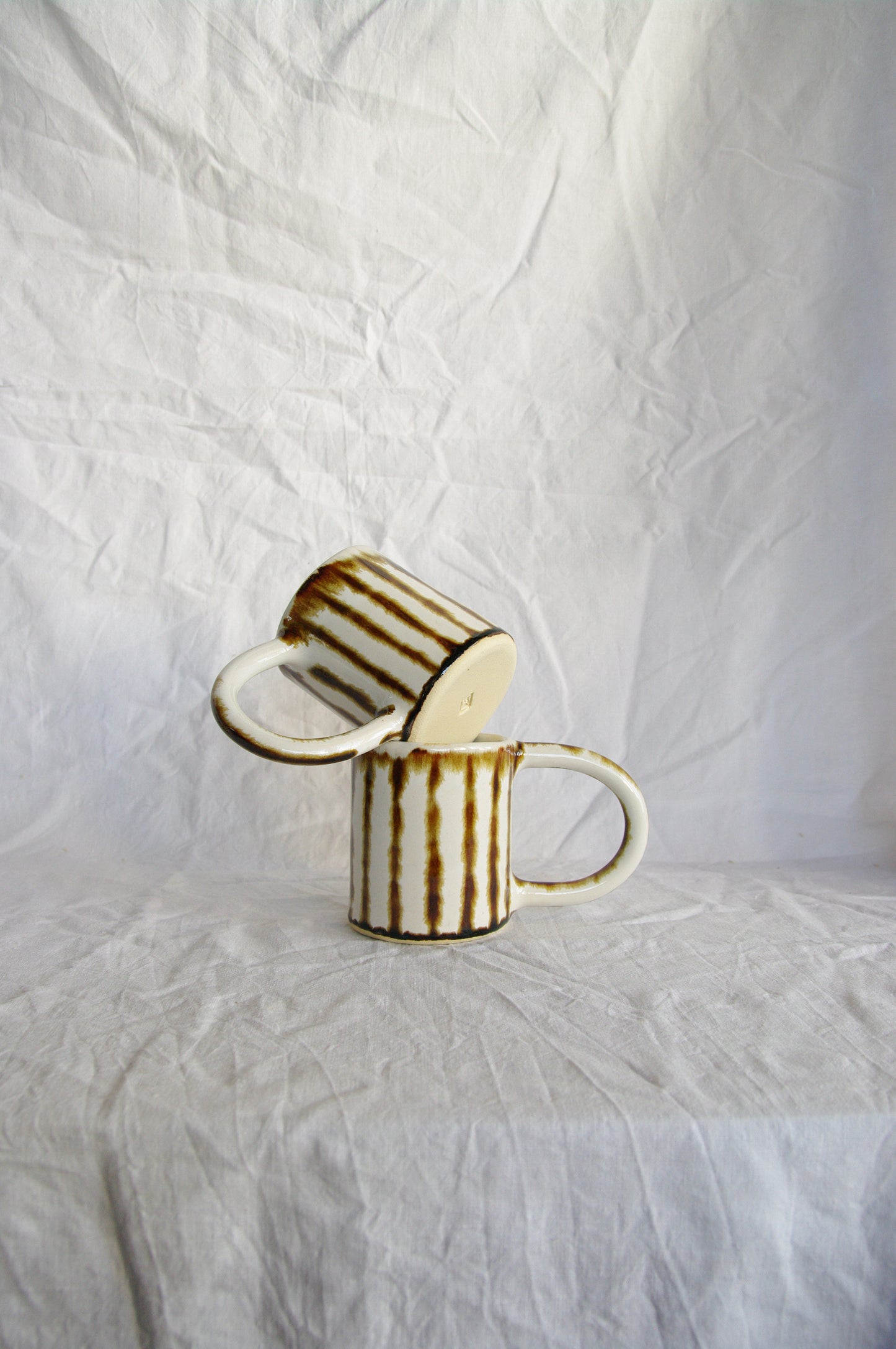 "Striped Mug" Artwork by Daisy Eltenton