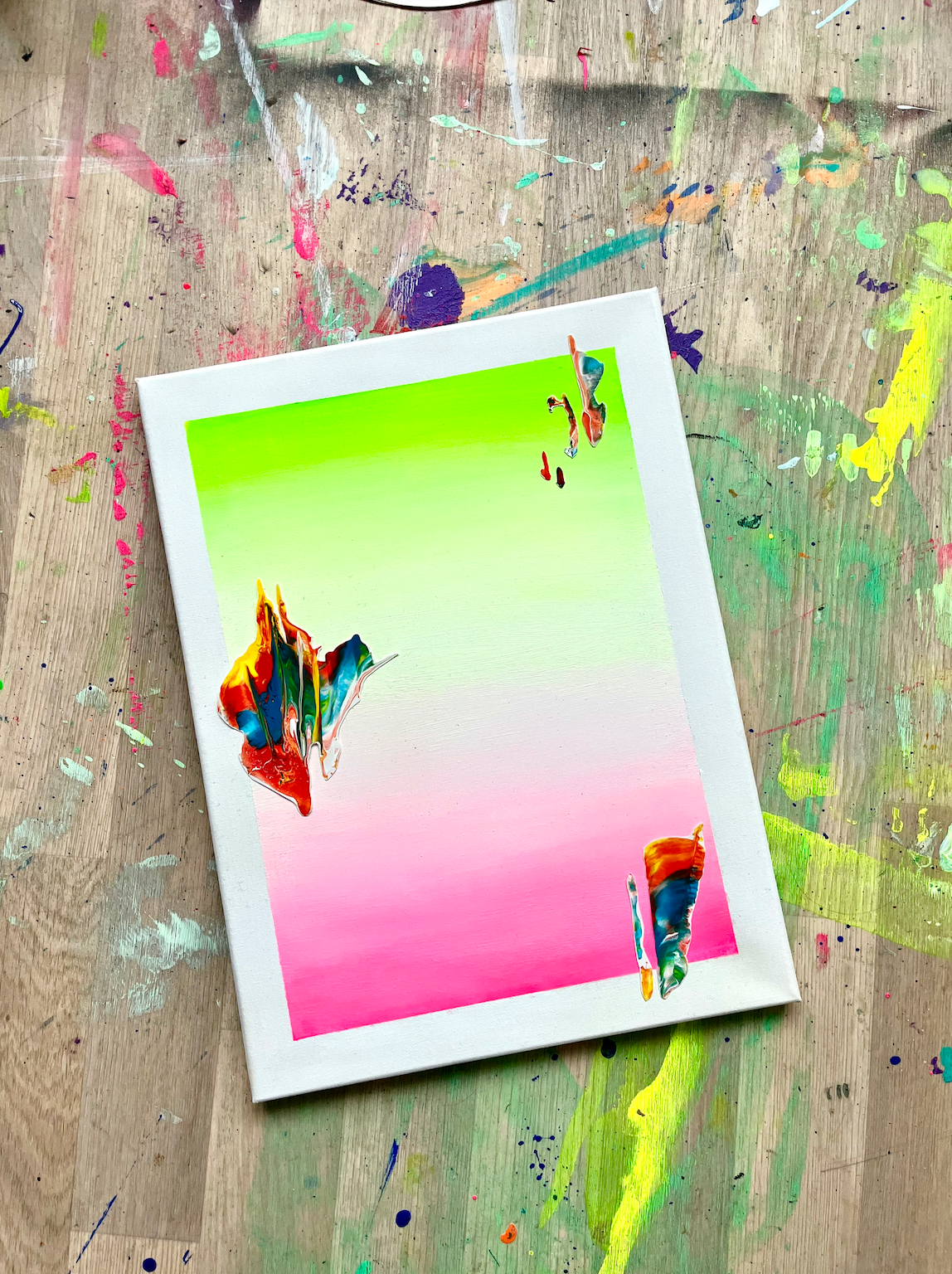Colorful abstract painting on a textured surface