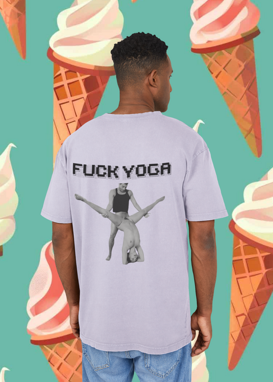 Person wearing a t-shirt with 'FUCK YOGA' text and graphic, standing against a colorful ice cream cone background.