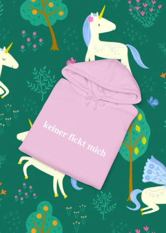 Pink hoodie with text on a green background with unicorns and trees