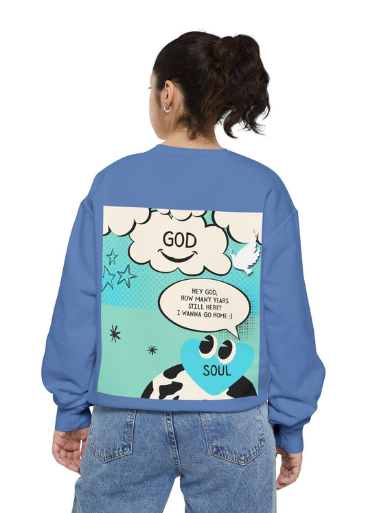 Person wearing a blue sweatshirt with a cloud design and text on the back, on a white background
